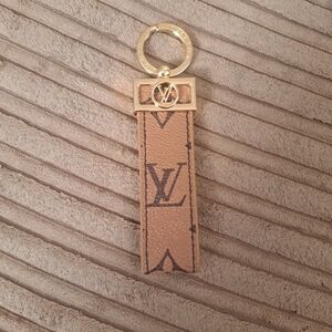 Louis Vuitton Beige and Gold Key Holder